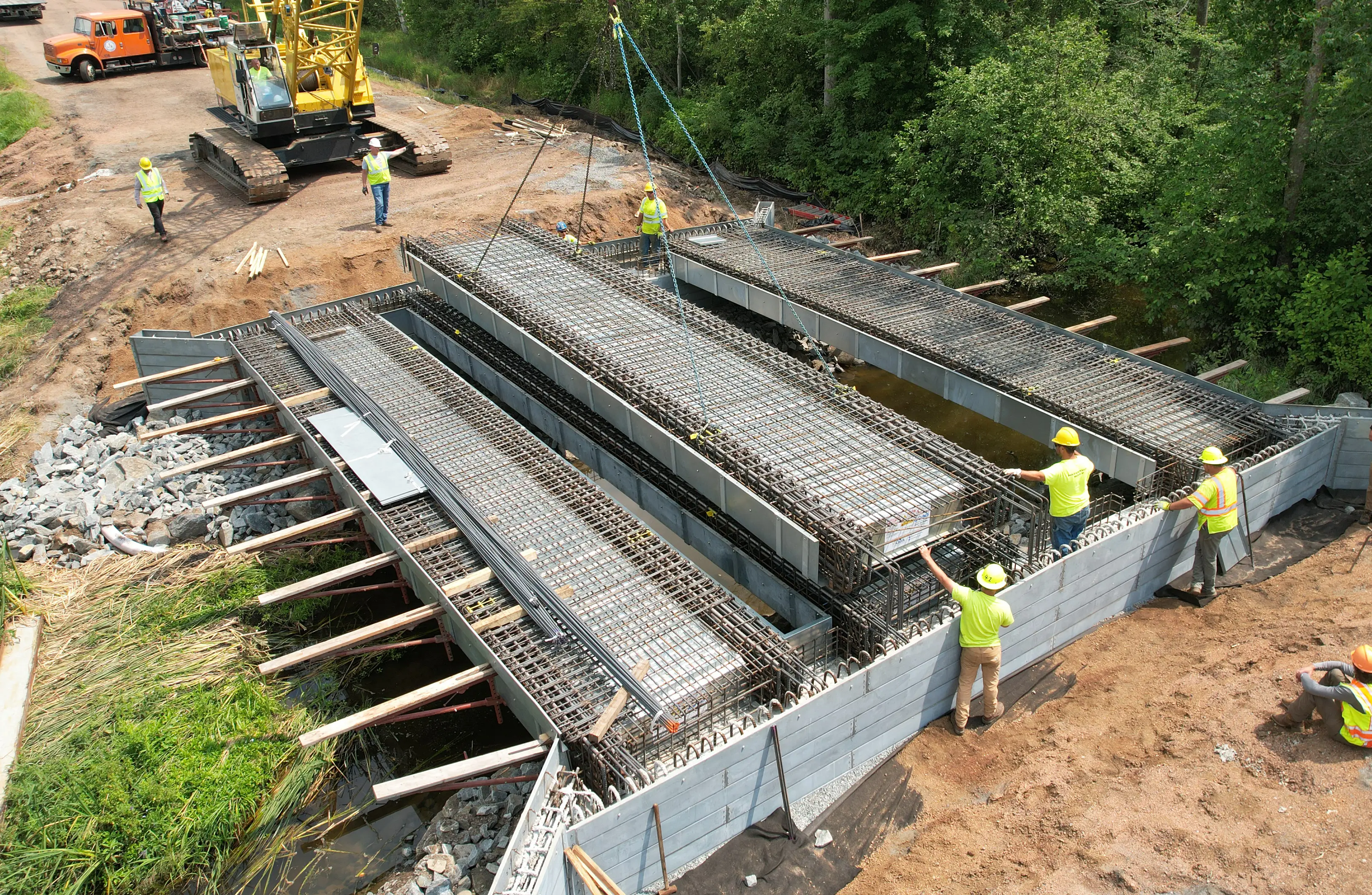 Overhead shot of an InQuik Bridge segment being placed at a bridge construction site.